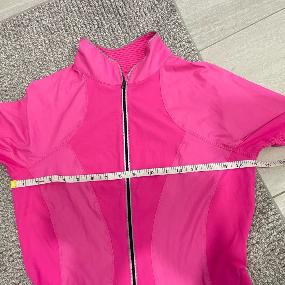 Lululemon Paceline Jacket
Pinkelicious size 6 cycling workout hoodless zip up - Picture 10 of 14
